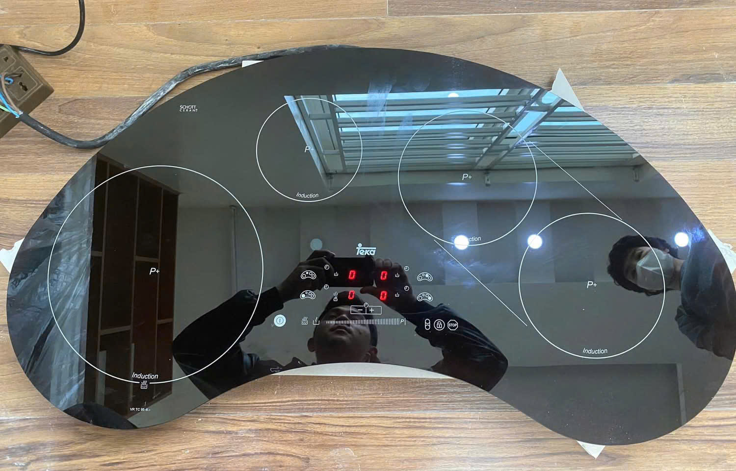 Thay mặt kính bếp từ Teka tại nhà