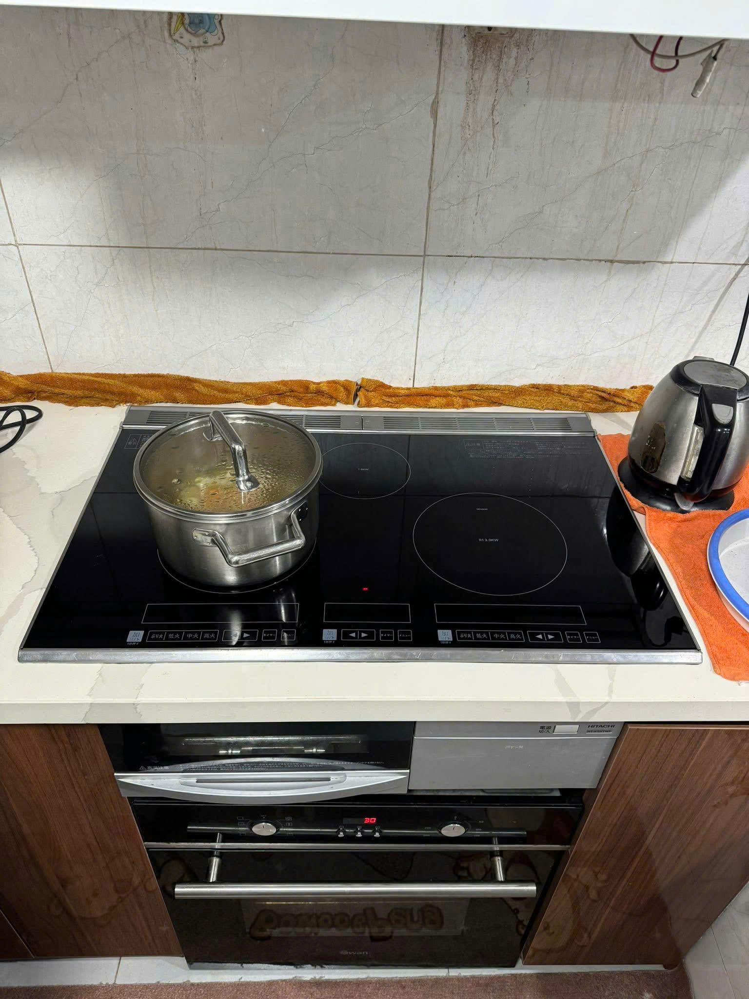 Thay mặt kính bếp từ nội địa Nhật chính hãng